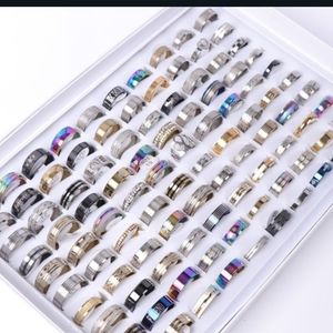 Unisex rings all different colors and sizes.